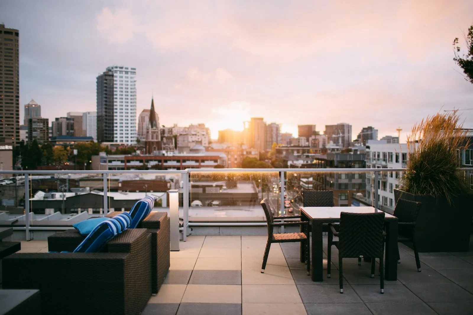 Terrace lounge overlooking the city at sunset